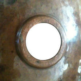 round copper sink for a colonial bathroom back view